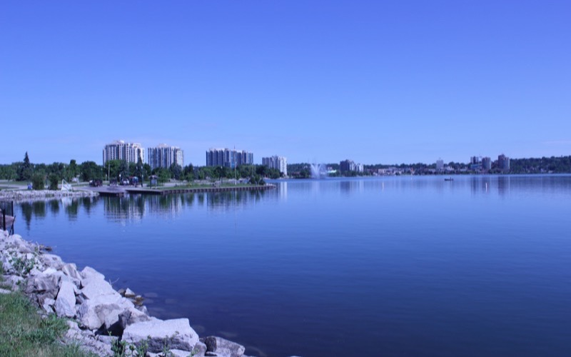 Barrie waterfront on Kempenfelt Bay with apartment buildings across the water